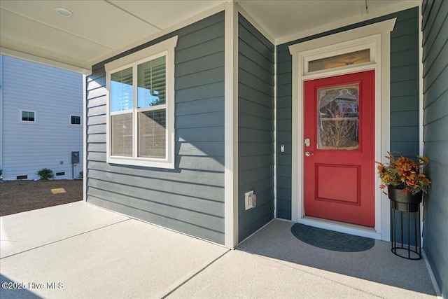 entrance to property with a porch