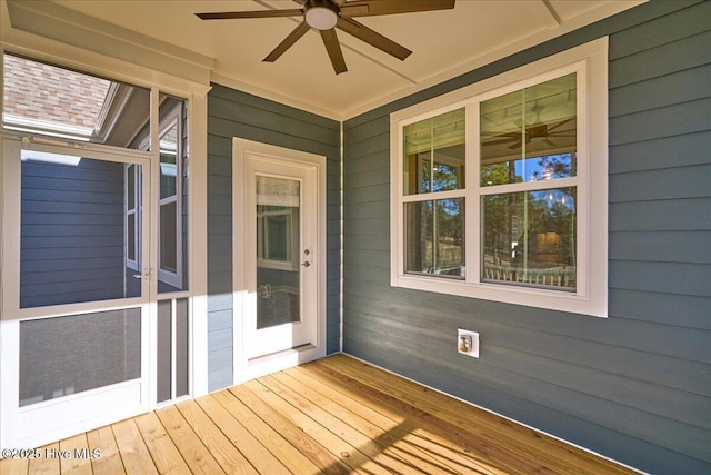 wooden terrace with ceiling fan