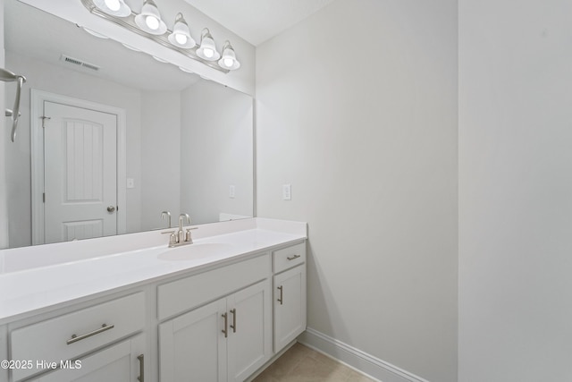 bathroom featuring vanity and tile patterned floors