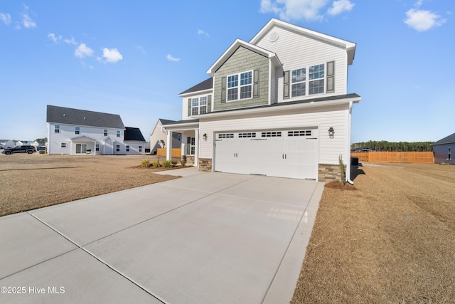 view of front of property featuring a garage