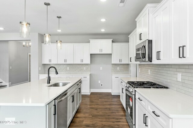 unfurnished dining area featuring an inviting chandelier and wood-type flooring