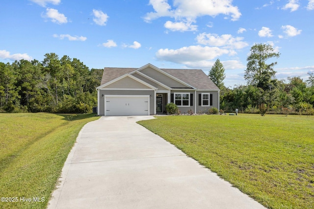 view of front of home featuring a front yard and a garage