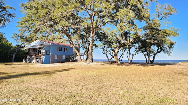 view of yard with a water view