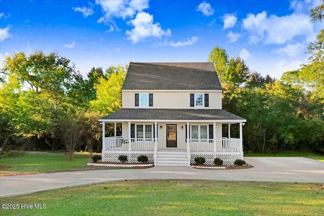 farmhouse-style home with a porch and a front yard