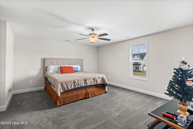 bedroom with ceiling fan and carpet