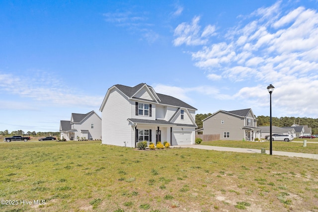 front of property with a garage and a front lawn