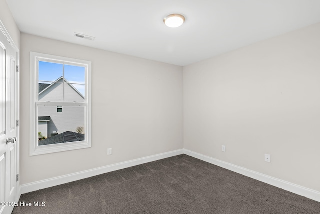 view of carpeted spare room