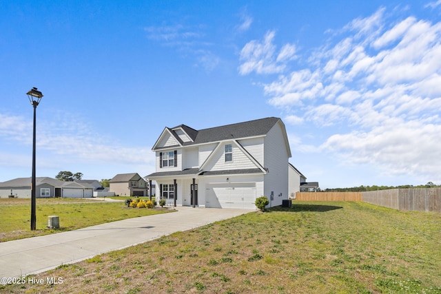 view of front facade featuring a garage and a front lawn