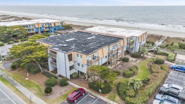 aerial view featuring a beach view and a water view