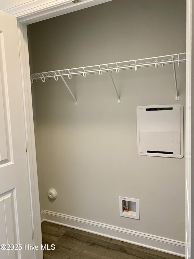 laundry area featuring hardwood / wood-style flooring