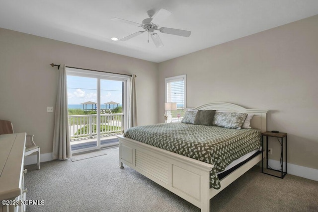 bedroom with carpet flooring, access to outside, and ceiling fan