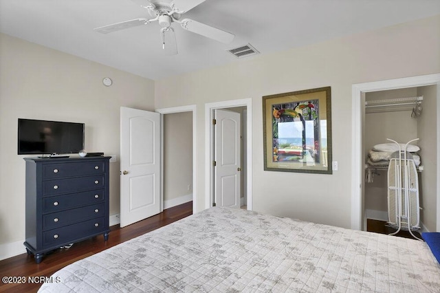 bedroom with ceiling fan, dark hardwood / wood-style floors, and a closet