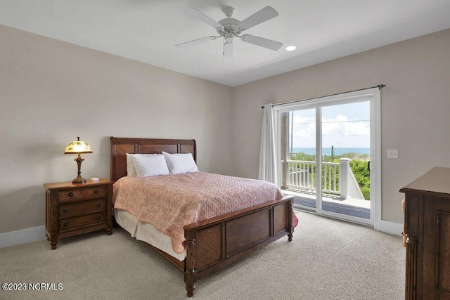 bedroom featuring access to exterior, ceiling fan, and light colored carpet