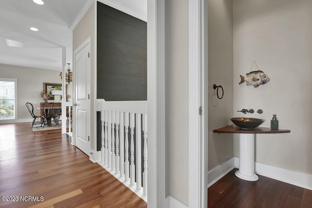 corridor with dark hardwood / wood-style floors