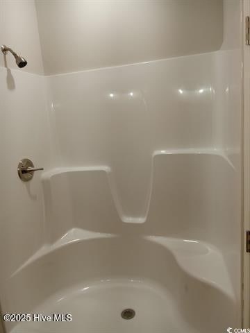 bathroom with walk in shower