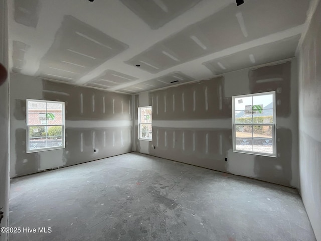 spare room featuring plenty of natural light