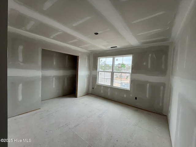 unfurnished bedroom featuring a closet