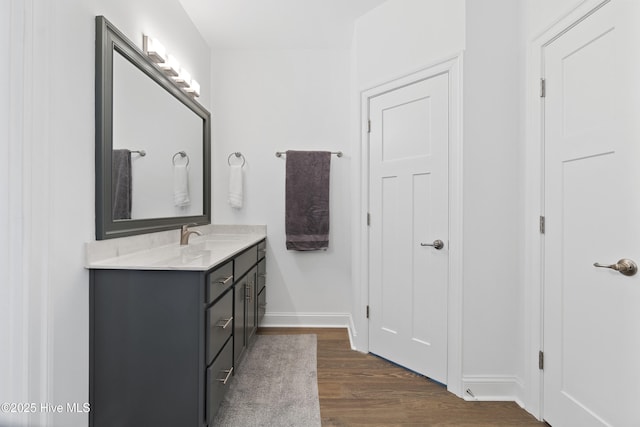 bathroom featuring hardwood / wood-style floors and vanity