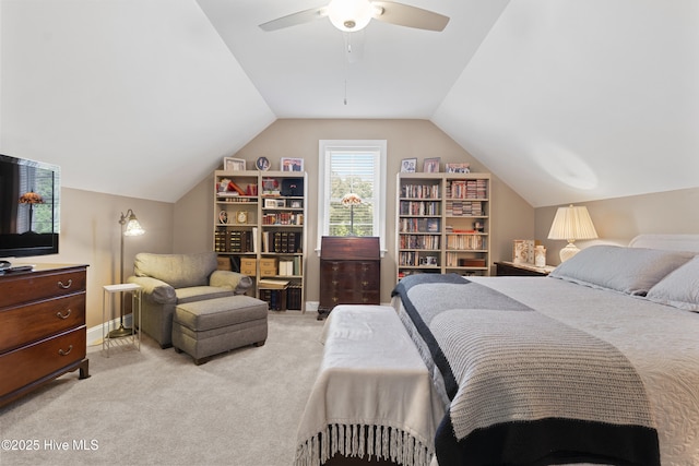 bedroom featuring ceiling fan, light carpet, and lofted ceiling