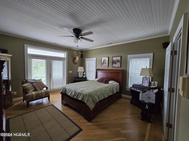 bedroom with french doors, wood-type flooring, access to outside, ornamental molding, and ceiling fan