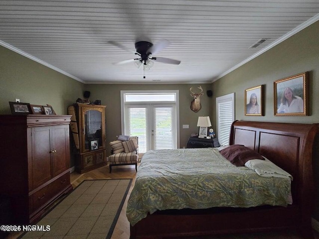 bedroom featuring hardwood / wood-style flooring, ceiling fan, access to exterior, and crown molding