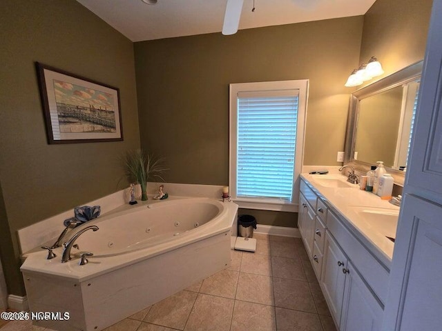 bathroom with vanity, a bath, tile patterned floors, and ceiling fan