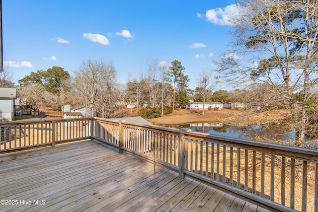 deck featuring a water view