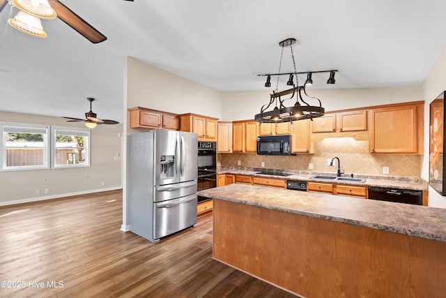 kitchen with ceiling fan, decorative backsplash, dark hardwood / wood-style flooring, black appliances, and sink