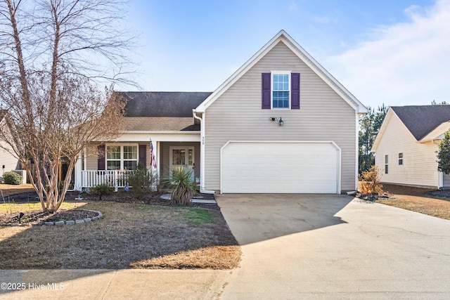 view of front of house featuring a porch and a garage