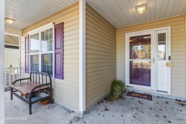 doorway to property with a porch