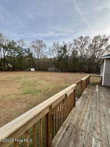 deck featuring a lawn