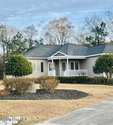 single story home with covered porch