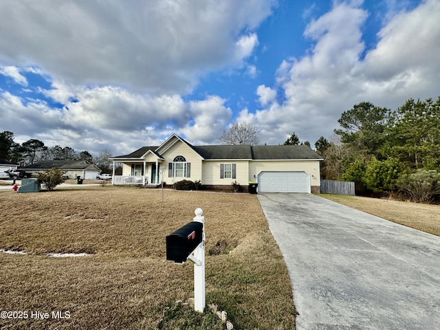 single story home featuring covered porch and a garage