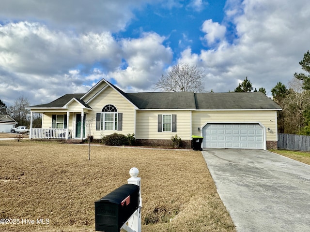 single story home with covered porch and a garage