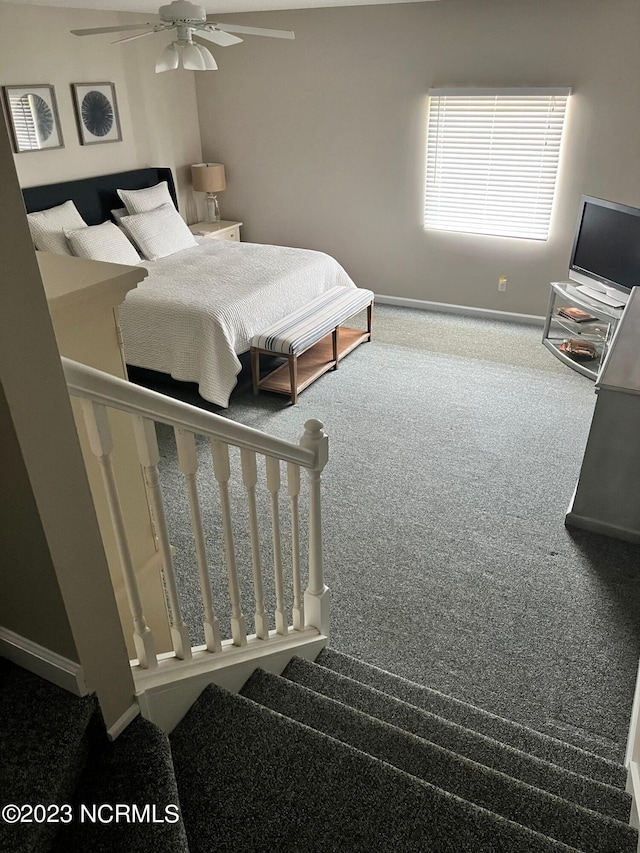 bedroom with ceiling fan and carpet floors