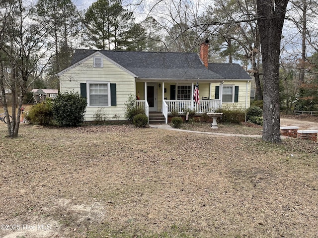 ranch-style house featuring a porch