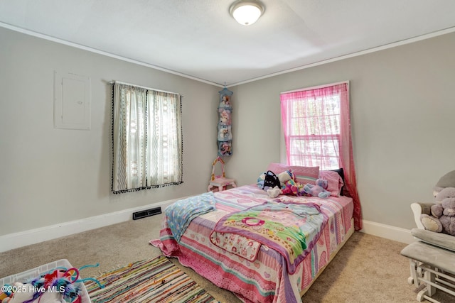 carpeted bedroom featuring crown molding, baseboards, and visible vents