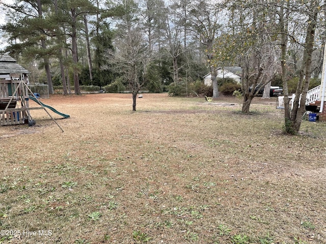 view of yard with a playground