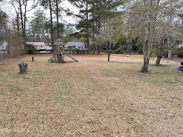 view of yard with a playground