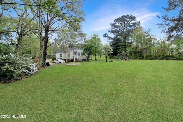 view of yard featuring a playground