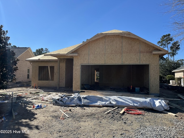 unfinished property with an attached garage