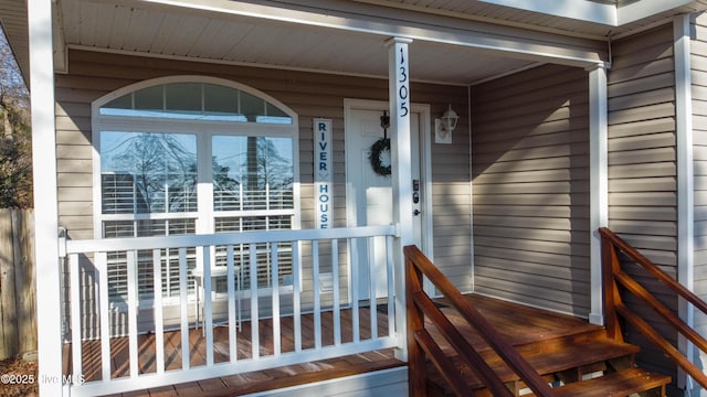 doorway to property with covered porch