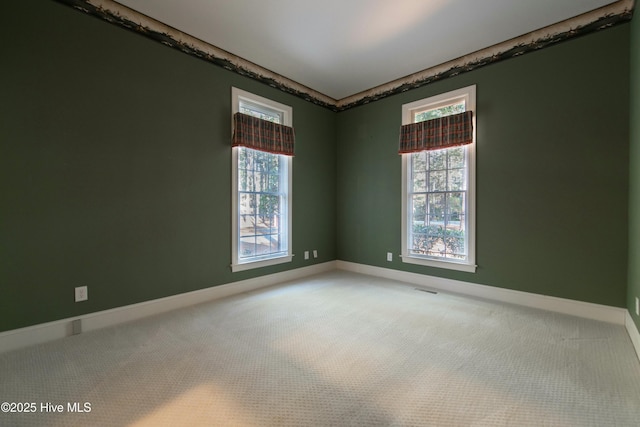 view of carpeted spare room