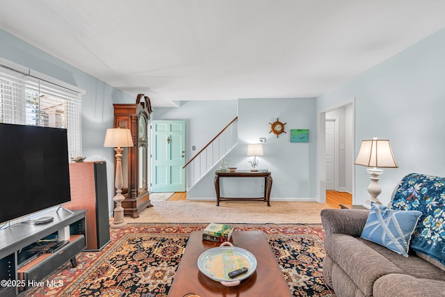 living room featuring light carpet