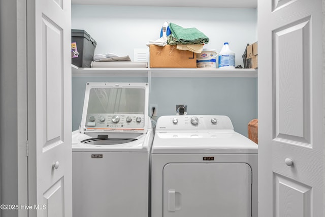 laundry area with independent washer and dryer