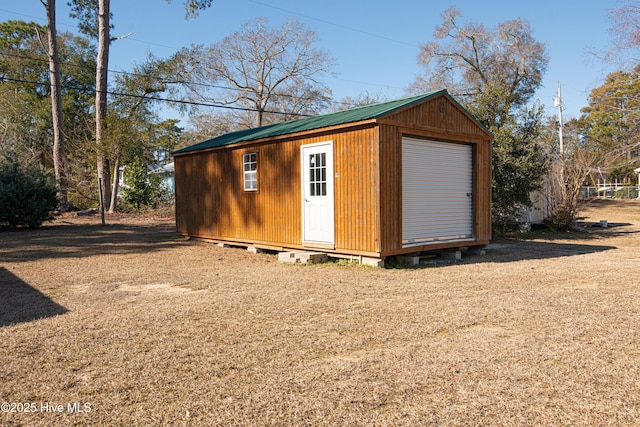 view of outdoor structure with a garage