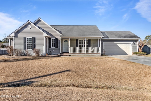 ranch-style home featuring a garage and covered porch