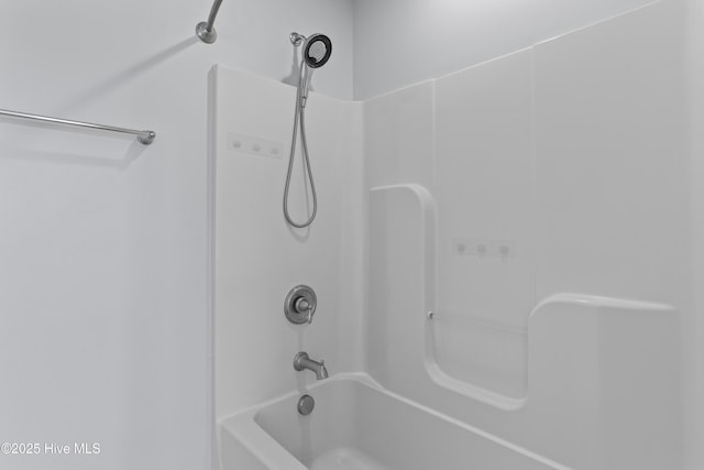 bathroom with shower / bathing tub combination