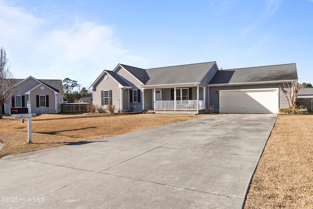 single story home featuring a garage and covered porch