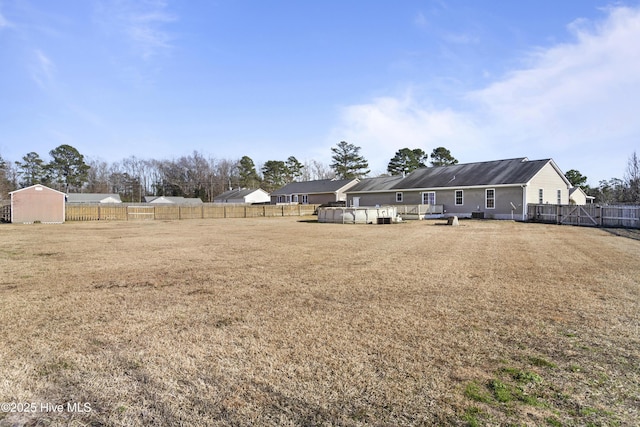 view of yard with a swimming pool